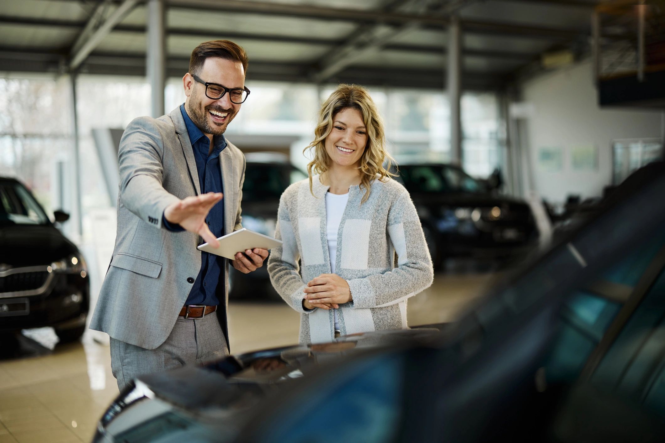 Happy customer at an automotive business